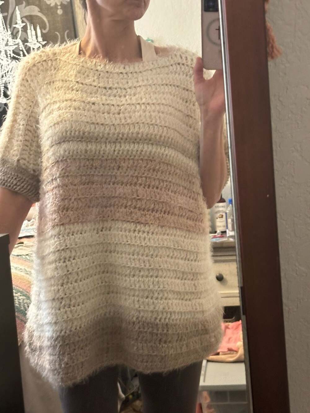 Handmade crocheted top. Fits size small two large.